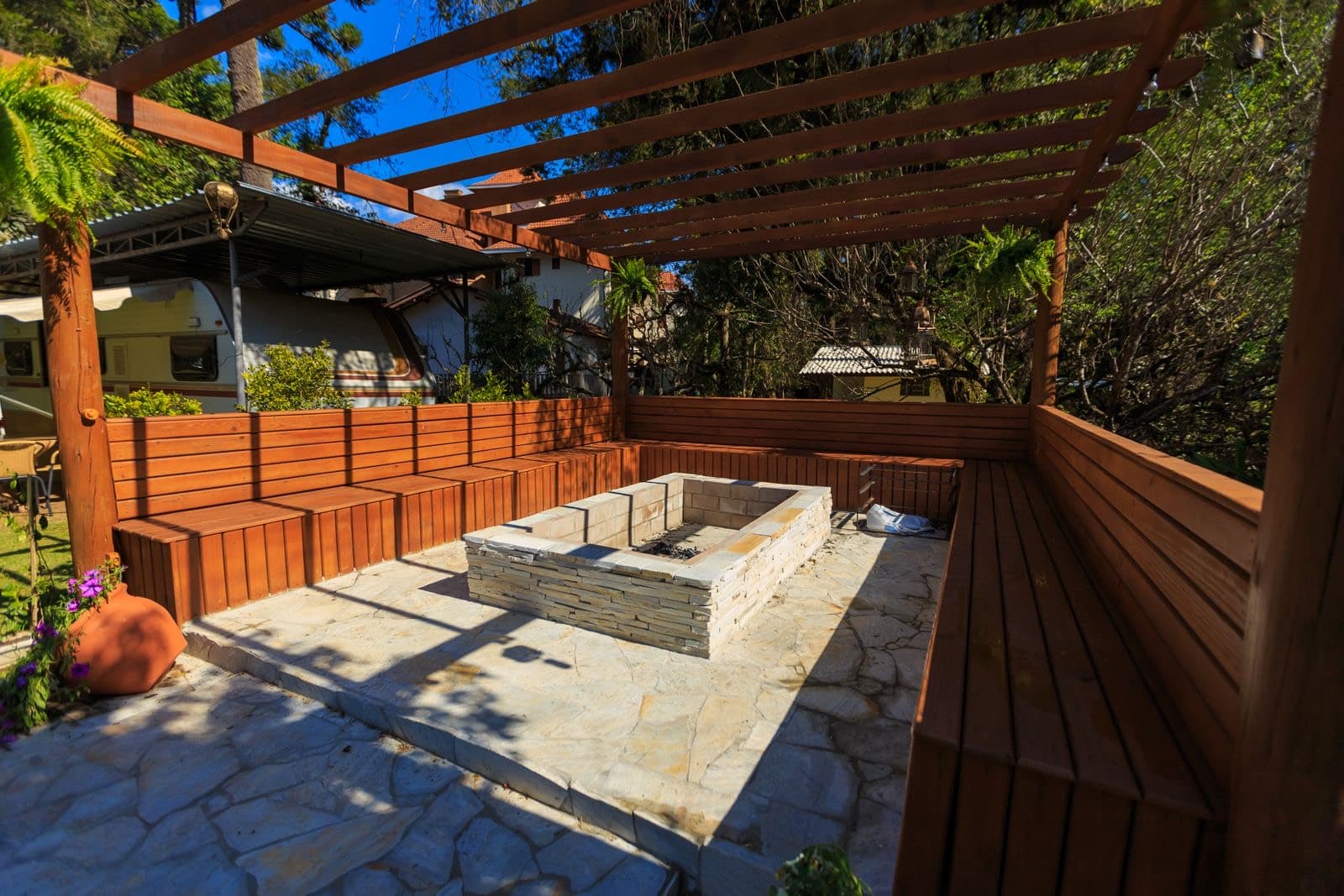Backyard pergola and stone fire pit, Stonebrook Landscapes demo site