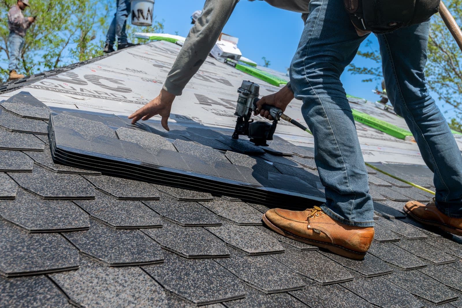 Roofing crew installing shingles, Northpoint Roofing demo site